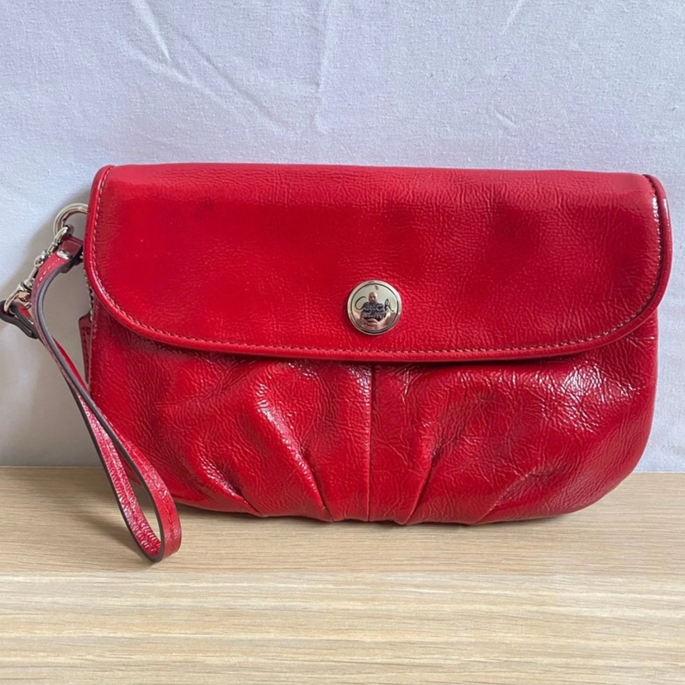 Coach Red patent leather large wristlet clutch.